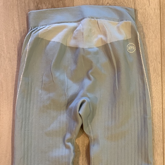 Salomon Primo Warm Seamless Tights Large NWOT - Picture 6 of 6